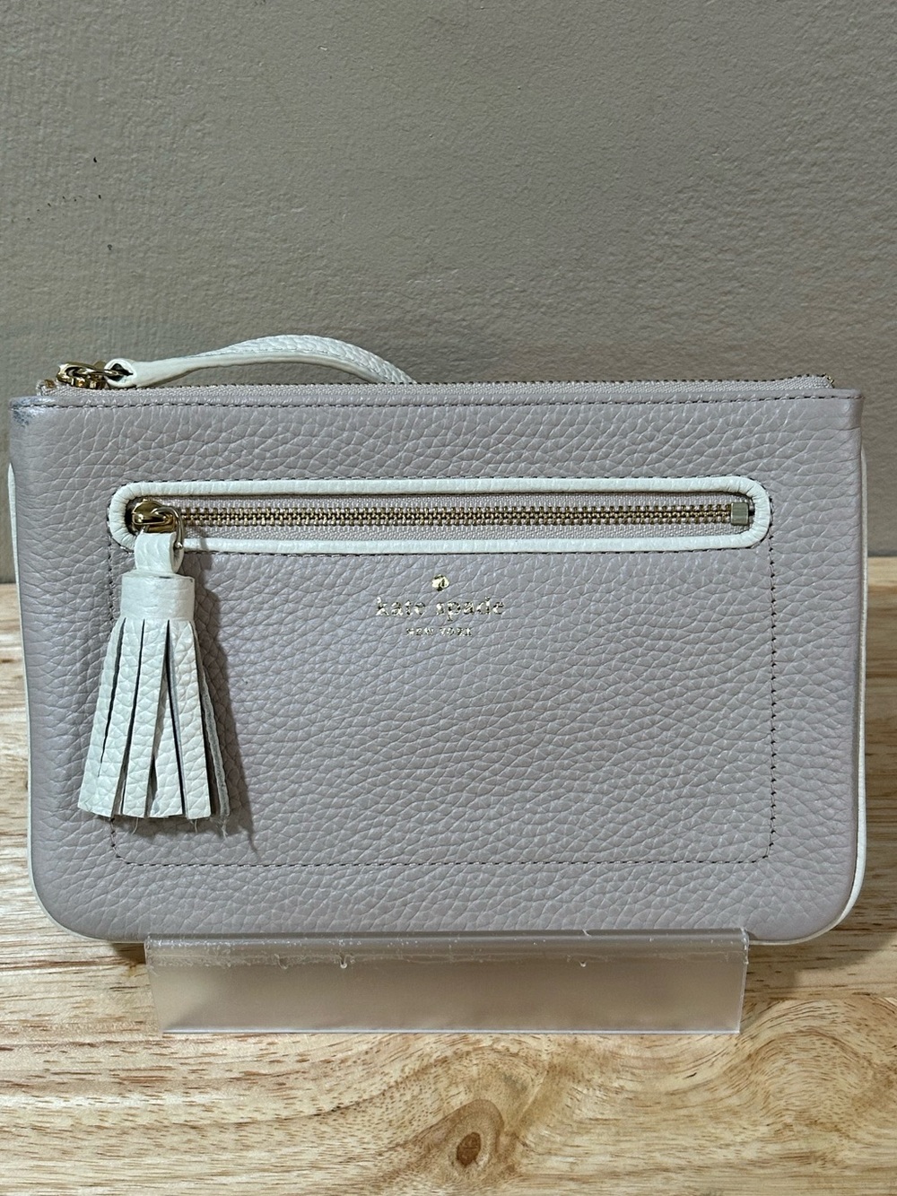 kate spade pebbled leather wristlet in light taupe with beige trim
